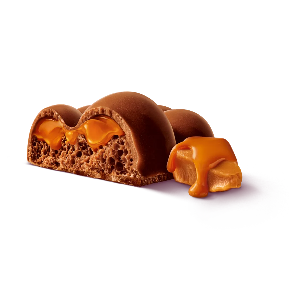 Ein Stück von der Milka Mmmax Schokolade der Sorte Luflee Caramel